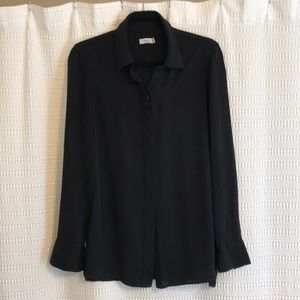 Black long sleeved silk blouse in VG condition